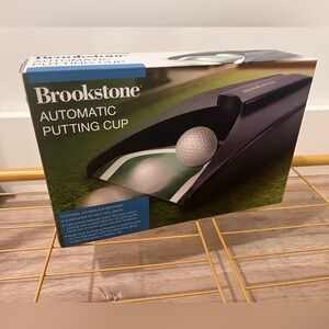 Brookstone Black Automatic Putting Cup